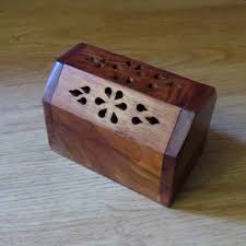 The incense will generally extinguish on its own and begin to slowly burn, but if it continues to flame, you can simply blow it out and it should proceed to smolder. Incense Cone Burner Box