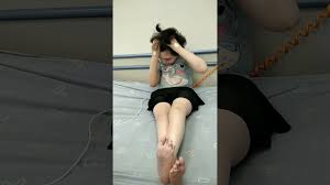 Arayl plays with her hair while waiting to see the doctor - YouTube