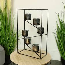 13,190 black metal candle holder products are offered for sale by suppliers on alibaba.com, of which wedding decorations & gifts accounts for 1%, other home there are 11,591 suppliers who sells black metal candle holder on alibaba.com, mainly located in asia. Black Wire Metal Framed Candle Holder
