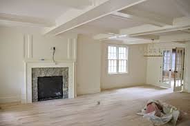Trim And Walls Are Benjamin Moore Navajo White With Satin Finish On Trim And Eg Shel Finish On Small Basement Remodel White Paint Colors Basement Living Rooms