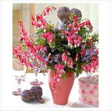 Spring Bouquet With Dicentra Spectabilis And Myosotis In Vase Bleeding Heart Flower Flower Bouquet Wedding Bleeding Heart