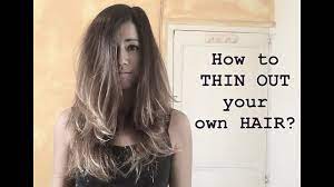 Glide the shears down the hair's shaft to thin the hair. How To Thin Out Your Own Hair Youtube