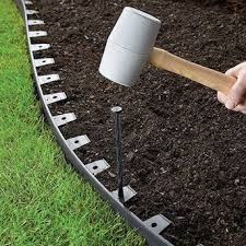 Easyflex 100 Ft Black Plastic Landscape Edging Roll Lowes Com In 2021 Plastic Landscape Edging Metal Landscape Edging Landscape Edging