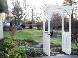 Old doors can also become part of functional areas in your garden. Make A Garden Arbor From Old Wooden Doors How Tos Diy