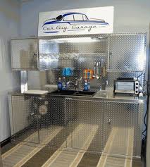 In this video we show how to reclaim some of your garage space by building a raising/lowering shelving system to store items overhead in your garage. Diamond Plate Kitchen Garage Cabinets Diamond Plate Garage Cabinets Diy Overhead Garage Storage