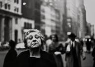 Diane Arbus | DIANE ARBUS, WOMAN ON THE STREET WITH HER EYES CLOSED, N.Y.C., 1956 (14) | MutualArt