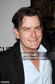 Ana Maria Reyes, Charlie Sheen and Melanie Sterner attend... News Photo