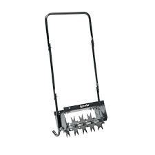 A plug aerator actually pulls out small plugs of grass and soil. Agri Fab Push Spike Aerator 45 0365 The Home Depot