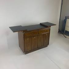 The cabinet is perfectly combinable with other furniture in the be my guest collection, but also adds a touch of sophisticated warm nordic. Campaign Style Dry Bar Cabinet Server W Convertible Server Bar Of Wood And Brass At 1stdibs