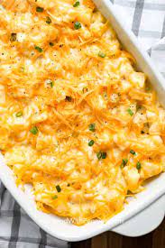 This Cheesy Potato Casserole Is Loaded With Potatoes Cheese Sour Cream And Spices To Make It The Pe Cheesy Potatoes Easy Flavorful Vegetables Cheesy Potatoes