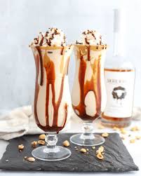 I used reese's pieces and reese's mini's to top mine. Peanut Butter Whiskey Milkshake Simply Made Recipes