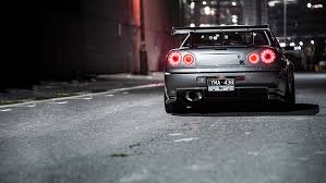 Nissan skyline four doorways wallpaper / 1999 nissan skyline r34 four door with an sr20 nissan skyline r33 nissan gtr skyline. Hd Wallpaper Silver Nissan Skyline Gtr R34 Night Lights Organic Metal Lane Wallpaper Flare