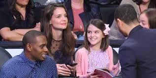 Thanks to her parents, she landed in the tabloid. Suri Cruise Looks Just Like Katie Holmes In New Photo Katie Holmes Daughter Is Her Doppelganger Now