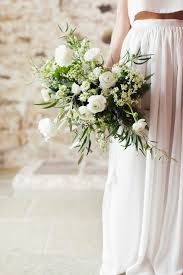 Smaller wreaths and floral hoops are typically displayed as decorative accents above an altar or table. 57 Innocently Beautiful White Bridal Bouquets Weddingomania