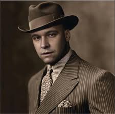 What are the consequences of running a lower temperature thermostat in a GM  vortec 8100 engine?