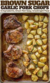 Oven Baked Pork Chops Covered In Brown Sugar And Garlic On A Sheet Pan With Yukon Potatoes One Pork Chop Dinner Pork Chop Recipes Baked Easy Pork Chop Recipes