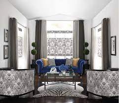 Combine Two Different Color Panel Drapes To Compliment Your Room S Decor Inspired Drapes By Budget Blinds Blue Living Room Decor Luxe Living Room Room Decor