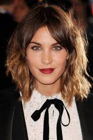 Messy hair, a blazer, jeans, and boots. Alexa Chung Best Hairstyles Hair Make Up Looks Glamour Uk
