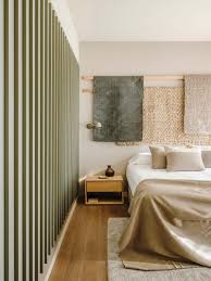 Check out these 25 wood walls sure to inspire! Draped Natural Fabrics Create A Unique Textural Decorative Element On This Bedroom Wall