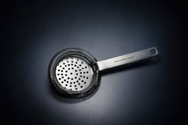 Strain with a julep strainer, but if you don't have one a hawthorne strainer can be substituted. Hawthorne Strainer