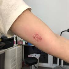 Whether you're getting your first tattoo. 20 Red Ink Tattoos That Ooze Sophistication