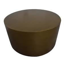 In a hammered finish, this coffee table has an. 44 Off West Elm West Elm Metal Drum Coffee Table Antique Brass Tables