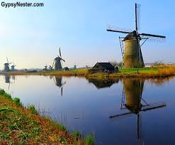 All the phases of the history of our struggle against water are still visible here. The Gypsynesters Tilting At Windmills In Kinderdijk Holland
