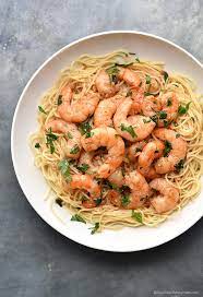 Add stock and lemon juice and simmer until the stock is reduced by half. Easy Shrimp Scampi Recipe She Wears Many Hats
