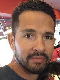 APECHS counselor Eddie Reyna focuses