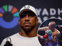 Tyson Fury is consoled by wife Paris as he storms out of ring following  Oleksandr Usyk defeat