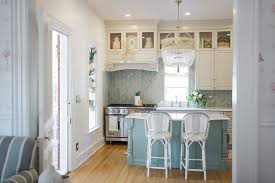 The panel can be squared, arched or if you're looking to spruce up your kitchen on a low budget, painting your. How To Run Kitchen Cabinets Across A Low Window The Leslie Style