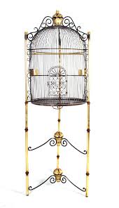 The vintage and antique bird cage (or birdcage) is something of a paradox: Fleur De Lis Living Royal Birdcage On Stand Wayfair