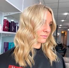 Hello, everyone! I'm Audrey, a hairstylist and bridal artist based in  O'Fallon. I specialize in lived-in color, blonding, and layered cuts, and  I'd love to help you achieve your perfect look! I'm