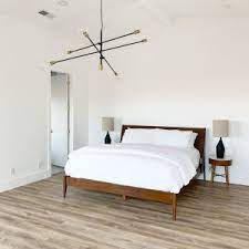 The upholstered version features a headboard with a light gray, natural linen color. Wright Bed