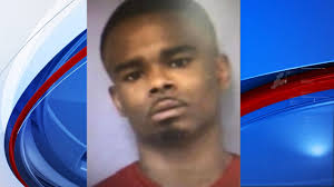 Fugitive in handcuffs bails out of bondsman's car