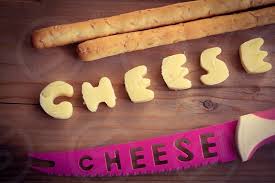 When not to pronounce b, d, and l in english. Cheese Cheesy Cheddar White Cheese Dairy Rustic Words Letters Spelling Mild Mature Text Appetiser Copy Space Culinary Fat Food Fresh Snack Board Alphabet Milk Product Cutting Chopping British English Calcium Nutrition Gourmet