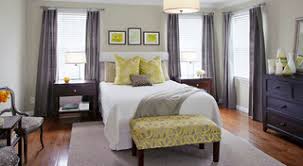 Here, yellow walls serve as a pop of color in a room that features a black and white color scheme. Grey And Yellow Bedroom Ideas And Photos Houzz