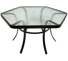 One In Stock Hexagon Glass Patio Table 62 W X 29 5 H Patio Table Table Patio