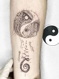 Yin yang tattoos are not new. The Best Yin Yang Tattoo Meaning Design Ideas Tattoodo