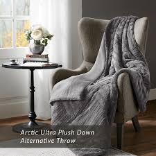 The most common chair throw over material is polyester. Designer Living