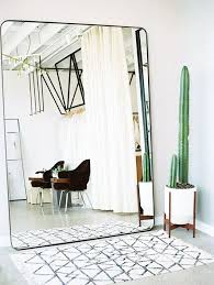Invigorate your space with the sophisticated accent of a leaner mirror. Mirror Images Sfgirlbybay