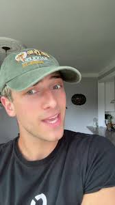 Cute Dude Standing in Front of A Mirror