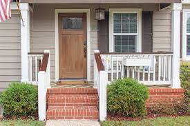 Find a prop, such as a broom handle or step stool, to keep the door at your desired height while painting. How To Paint A Door To Look Like Wood Checking In With Chelsea