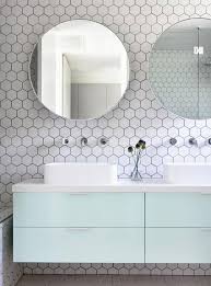 The blues and coastal grays in the tile brought together the light blue paint and dramatic veining of the marble countertop. 60 Stylish Hexagon Tiles Ideas For Bathrooms Digsdigs