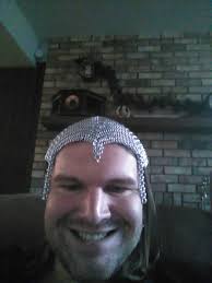 The maille coif's construction is complete! All that's left is to rivet the  remaining open rings shut!