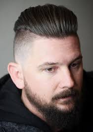 This brad pitt long hair style has the hair falling behind the ears with the fringes appearing like feathers. Brad Pitt S Fury Haircut A Stylish Undercut Gallery