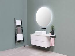 Wallpaper in a bathroom acts like artwork and gives the space another dimension. 5 Money Saving Ways To Achieve A Designer Bathroom Salon Prive Mag