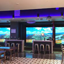 The golf swing simulator reflects a. Photos At Olympic Golf Zone 6988 Beach Blvd B208