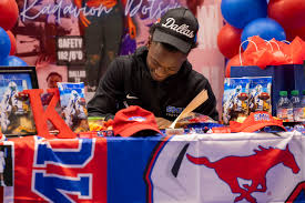 D1 bound! See photos of Duncanville football players signing national  letters of intent