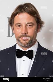 Guests attend the BMI London Awards 2017 Featuring: Jack Bevan, Yannis  Philippakis and Edwin Congreave of Foals Where: London, United Kingdom  When: 09 Oct 2017 Credit: Phil Lewis/WENN.com Stock Photo